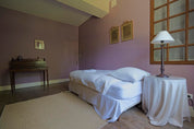 Chambre privée avec lit simple de la Suite pourpre au Château Armand Heitz, chambres d'hôtes en Bourgogne