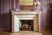 Cheminée de la chambre violette, chambre d'hôtes au Château Armand Heitz en Bourgogne