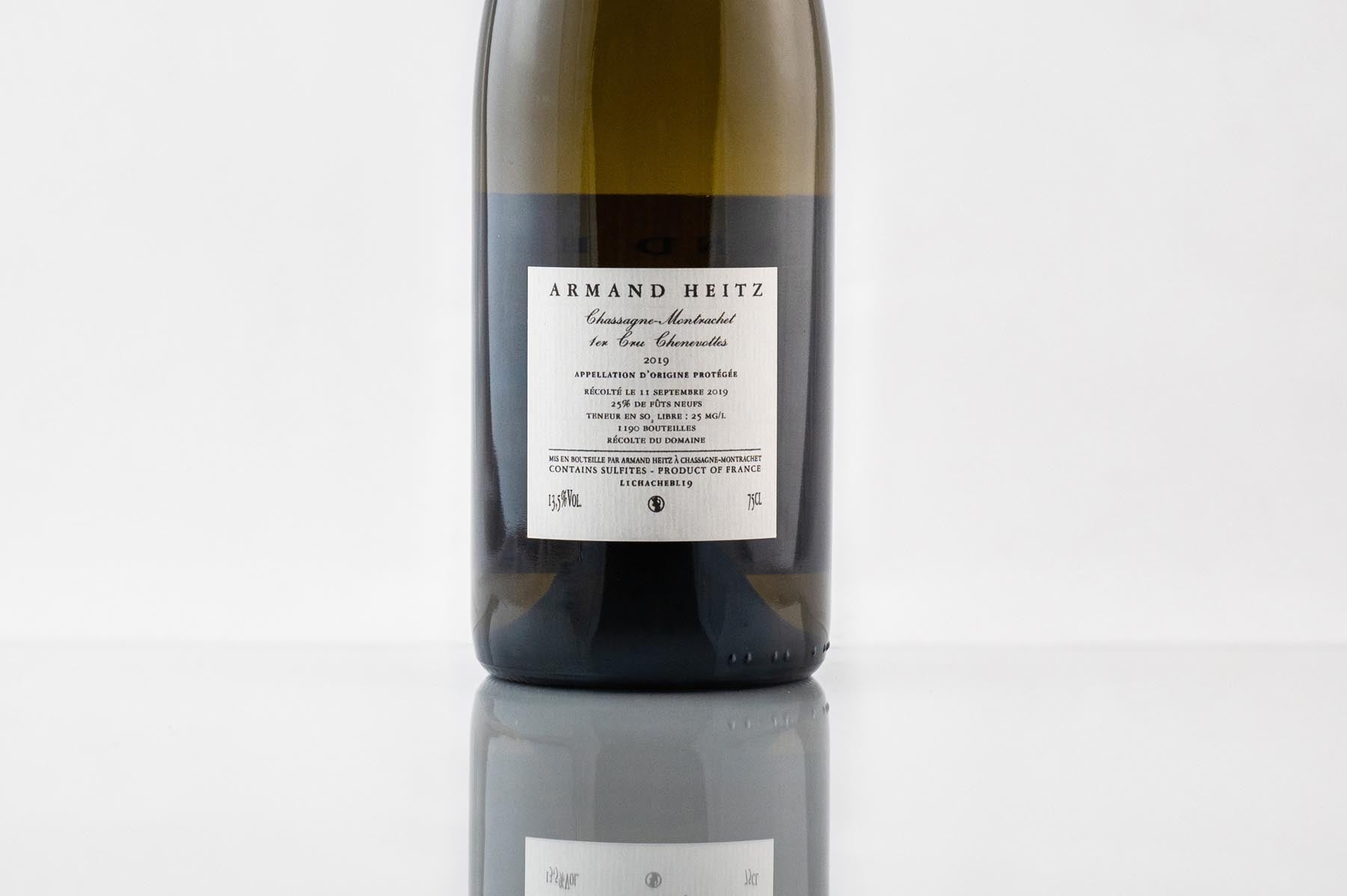 Chassagne-Montrachet 1er Cru Chenevottes 2019 Armand Heitz contre étiquette